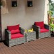 Two cushioned red chairs and a glass-top table from the 3 Pcs Patio Rattan Furniture Bistro Sofa Set for outdoor.