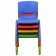 Stacked colorful plastic children chairs in blue, red, yellow, and green, perfect for playrooms and daycare settings.
