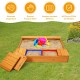 Cedar sandbox with two storage boxes, designed for kids to dig and play comfortably in outdoor settings.