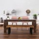 Solid acacia wood dining bench with metal legs, featuring a polished surface for contemporary home decor.