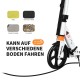 Folding adjustable kick scooter with 8" PU wheels, aluminum alloy frame, and shoulder strap for easy transport.