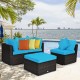 4-piece turquoise rattan wicker patio sofa set with cushions, ideal for outdoor relaxation by the poolside.