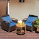 Two blue-cushioned patio chairs with a solid wood frame and a round coffee table, perfect for outdoor relaxation.