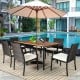 7-piece patio dining set with cushioned armchairs, acacia wood tabletop, and umbrella hole, ideal for outdoor.