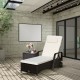Outdoor cushioned chaise lounge with adjustable backrest and PE rattan, perfect for poolside relaxation.