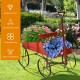 Wooden wagon plant bed with wheels in red, featuring two planting sections for flowers, ideal for garden or patio use.