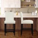 Beige kitchen chair with rubber wood legs, showcasing a soft cushion and curved backrest, perfect for kitchen or bar.