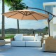 Beige 10 ft solar-powered LED patio offset umbrella with 360° rotation, perfect for outdoor relaxation and shade.