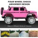 Pink 12V licensed Mercedes-Benz kids ride-on car with four-wheel shock absorbers, suitable for various ground types.