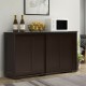Kitchen storage cabinet with wood sliding doors, featuring a spacious top and large storage compartment for kitchen.