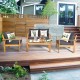Detail view of thick, removable cushions on the acacia wood chairs, enhancing comfort for outdoor gatherings.