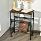 Narrow end table with a rustic wood top and mesh magazine holder, designed for easy storage in compact living areas.