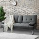 Convertible dark gray futon sofa bed with removable armrest and cup holders, perfect for apartments and compact spaces.