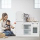Kids kitchen playset with realistic faucet, telephone, and storage, promoting imaginative cooking play for children.