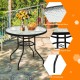 Curved leg design of the 32-inch round patio table with tempered glass top and umbrella hole, ideal for outdoor.