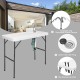 Folding cleaning sink table with sprayer, durable plastic surface, integrated drain, perfect for outdoor cleaning tasks.