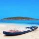 Inflatable stand up paddle board with American flag design, perfect for surfing, yoga, and fishing on water.