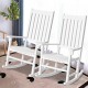White acacia wood high back rocking chairs with contoured seats, ideal for indoor and outdoor relaxation.