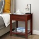 Wooden nightstand with drawer and open shelf, made of particleboard, ideal for bedroom or living room storage.