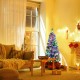 5 feet pre-lit Christmas tree with snow flocked branches and 140 LED lights, creating a festive atmosphere in a cozy.