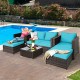 5-piece turquoise cushioned rattan patio furniture set with loveseat, sofas, and ottomans, ideal for outdoor relaxation.