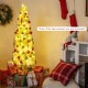 Whimsical 5 FT Christmas tree with bendable top, warm white LED lights, and snow flocking, perfect for holiday decor.