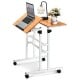 Height adjustable 2 in 1 computer desk with tilting surface, sturdy steel frame, and rolling wheels for versatile use.