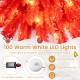 5 FT pre-lit artificial Christmas tree with 301 red and white branch tips, featuring 100 warm white LED lights for.
