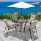 Patio square market table with beige umbrella and four chairs, perfect for outdoor use by the poolside or balcony.