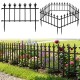 Decorative metal garden fence features a sturdy design with fleur-de-lis finials, perfect for elegant landscaping solutions.