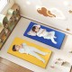 Two kids resting on colorful 2-inch thick nap mats in blue and yellow, ideal for daycare and home use.