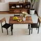 5-piece dining table set featuring a brown veneered MDF tabletop and 4 PU leather chairs, perfect for small spaces.