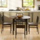 5-piece round dining table set in rustic brown with storage shelf, featuring a 40" table and four chairs in a kitchen.