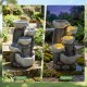 5-tier outdoor water fountain with LED lights, showcasing cascading water flow for patio ambiance, 17.5 inches high.