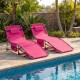 Two pink 5-position outdoor folding chaise lounge chairs by the pool, featuring adjustable footrests and cushioned.
