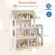 Wooden dollhouse with 33 furniture pieces, featuring movable stairs and a robust design for kids' imaginative play.