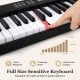 Full-size 61-key foldable electronic keyboard with touch-sensitive keys and wood grain surface for comfortable playing.