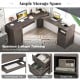 L-shaped dark gray computer desk with ample workspace, pull-out keyboard tray, and storage drawers for organized use.