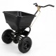 Walk-behind broadcast spreader with a 66 lbs capacity, featuring 13-inch all-terrain tires for efficient lawn and garden tasks.