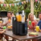 The 68 oz Frozen Drink Maker in black creates slushies and ice cream effortlessly, perfect for outdoor gatherings.