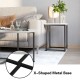 Round coffee table with X-shaped metal base and faux marble top, perfect for living room or office use.