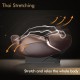Zero gravity massage chair in brown demonstrating Thai stretching for full body relaxation and comfort.