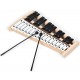Close-up of the 27-note glockenspiel xylophone's aluminum keys and wooden frame, perfect for developing musical skills.