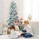 Snow-flocked 7 feet artificial Christmas tree with 1108 branch tips, perfect for creating a festive winter wonderland.