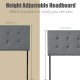 Adjustable tufted gray linen fabric headboard with two steel legs for queen and full size beds, showcasing height.