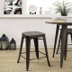 Industrial metal counter stool with elmwood seat, featuring a sturdy steel frame, perfect for dining or pub settings.