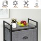 3-in-1 portable dresser with 8 fabric drawers and metal rack, featuring a sturdy design for versatile storage solutions.