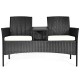 Wicker patio loveseat with removable cushions, featuring weather-resistant rattan and chic design, perfect for outdoor.