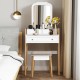 Vanity table set with cushioned stool, large mirror, and three drawers for organized cosmetics and stylish decor.