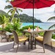 Round umbrella base stand made of premium cast iron in classic bronze, designed for stability with patio umbrellas.